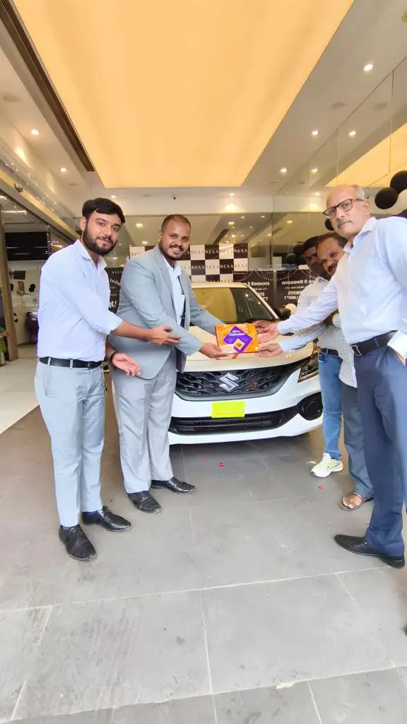 car-delivery-ceremony-at-a-dealership |Vishwa Mangal Motor Driving School